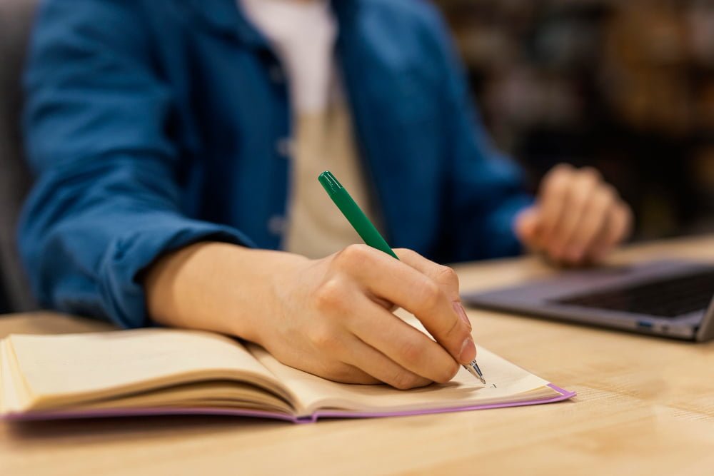 boy studying in the university library